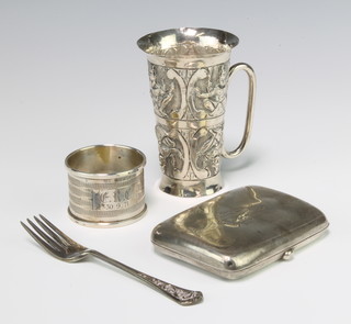 A silver cigarette case Chester 1919, napkin ring, fork and marriage cup, weighable silver 82 grams 