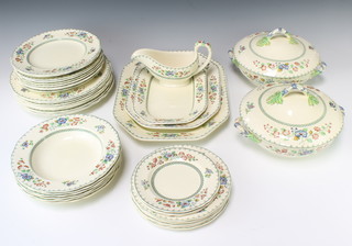 A set of Copeland Spode Strathmere dinner ware comprising 3 small plates, 6 medium plates, 9 dinner plates, 9 dessert plates, 3 graduated meat plates, 6 dessert bowls, 2 tureens and covers and a sauceboat 

