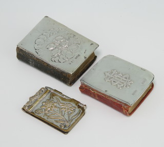 A silver mounted Reynolds angels aide memoire Birmingham 1906, a book of common prayer and an aide memoire