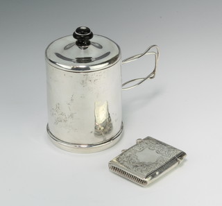 An Edwardian silver vesta Birmingham 1901 and a travelling cup (marks rubbed), gross 106 grams 