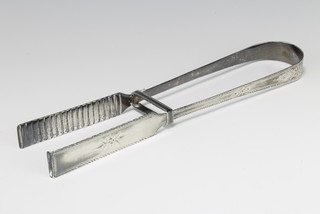 A pair of Georgian silver asparagus tongs with bright cut decoration by Hester Bateman 110 grams 