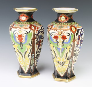 A pair of Noritake hexagonal vases decorated with flowers 32cm 
