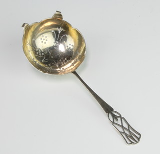 A silver tea strainer with pierced handle Sheffield 1936 maker Viners 38 grams