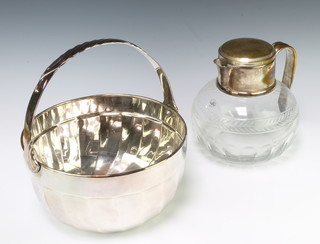 A silver plated swing handled bowl/ice bucket and a do. jug