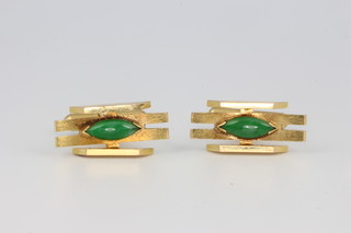 A pair of 14ct yellow gold green gem set cufflinks, 14.3 grams