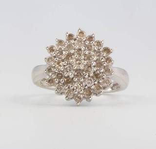 A 9ct white gold diamond cluster ring size J 1/2