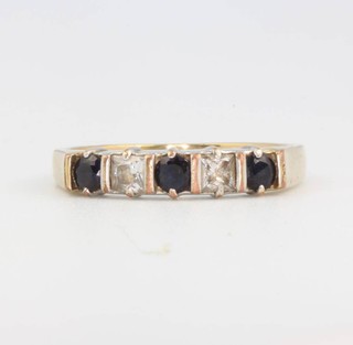 A gem set half eternity ring size P 