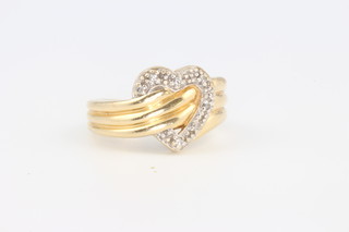 A 14ct yellow gold diamond set heart shaped ring, 5 grams, size J 