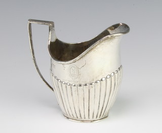 A Victorian demi-fluted silver cream jug London 1888, 130 grams