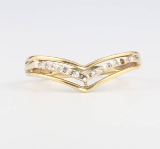 An 18ct yellow gold diamond set ring size Q 