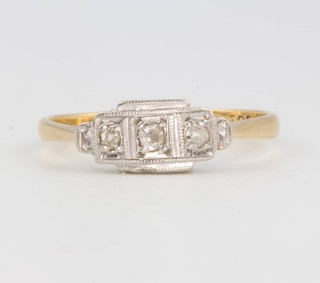 An 18ct yellow gold 3 stone diamond ring size M 