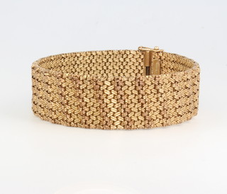 A 9ct yellow gold fancy flat link bracelet 36.2 grams 18cm 