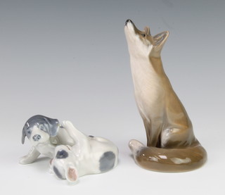 A Danish figure of a seated fox 1475 14cm together with a do. group of 2 puppies 453 10cm 