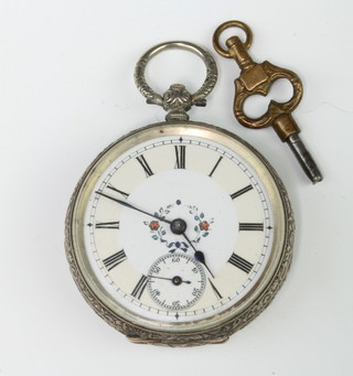 A lady's Edwardian silver cased key wind fob watch with floral dial  