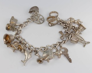 A silver charm bracelet, 42 grams 