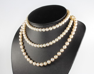 Two cultured pearl necklaces with 9ct gold clasps, 44cm and 66cm 