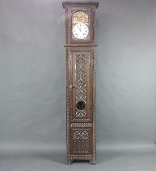 A 19th Century French 8 day striking comtoise clock with 24cm arched dial embossed birds amidst branches within enamelled dial and Roman numerals contained in a heavily carved oak case 225cm  