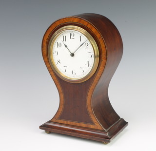 Bunen, a Swiss bedroom timepiece with enamelled dial and Arabic numerals, contained in an inlaid mahogany balloon shaped case 