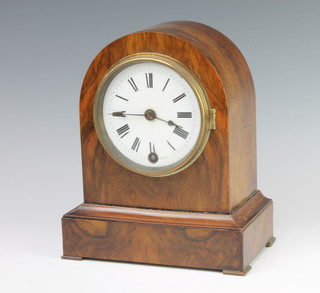 A 19th Century French 8 day mantel timepiece with enamelled dial and Roman numerals contained in an arched walnut case, the back plate marked W and H Sch 