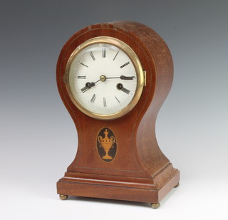 An Edwardian striking mantel clock with enamelled dial and Roman numerals contained in an inlaid mahogany balloon case 