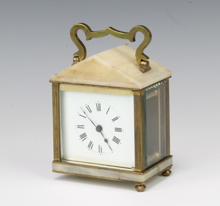 A 19th/20th Century French carriage timepiece with enamelled dial contained in an onyx and gilt metal portico shaped case, raised on bun feet 9cm x 8.5cm x 5.5cm 