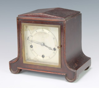 Gustav Becker, a chiming mantel clock with silvered dial and Arabic numerals contained in a shaped mahogany case 