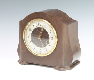 A 1930's Art Deco Smiths Enfield striking mantel clock with silvered chapter ring and Arabic numerals contained in an arched brown Bakelite case 