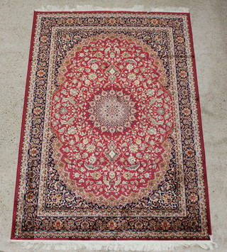A red and blue ground Kashan style Belgian cotton carpet with central medallion 280cm x 160cm 