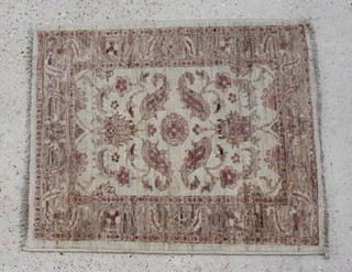 A Caucasian style Persian carpet 109 x 90cm 