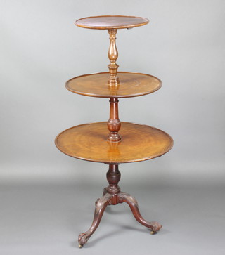 A Georgian mahogany circular 3 tier dumb waiter, raised on a tripod case with cabriole ball and claw supports 154cm h, top tier 44cm diam., middle 59cm diam., base 75cm diam. 