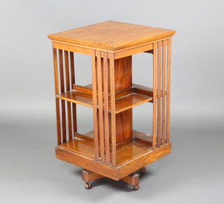 An Edwardian square mahogany 2 tier revolving bookcase 83cm h x 47cm w x 47cm d 