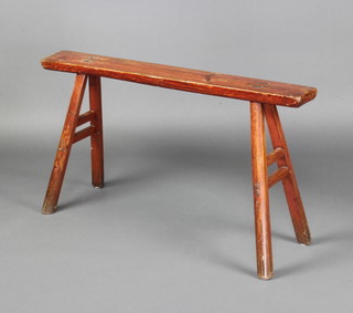 A Chinese rectangular hardwood trestle stool 54cm h x 95cm l x 12cm w 