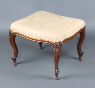 J Scanlan, a Victorian shaped carved mahogany stool with upholstered seat raised on cabriole supports, the base impressed J Scanlan 1237,  47cm h x 54cm w x 51cm d 