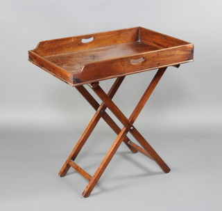 A Victorian rectangular mahogany butler's tray on folding stand 81cm h x 51cm x 76cm 