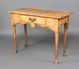 A 17th/18th Century light oak side table fitted a drawer, raised on club supports 63cm h x 96cm w x 45cm d  