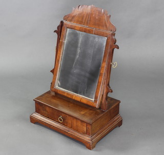 A Chippendale style rectangular plate dressing table mirror contained in a mahogany swing frame, the base fitted a drawer, raised on bracket feet 70cm h x 46cm w x 31cm d