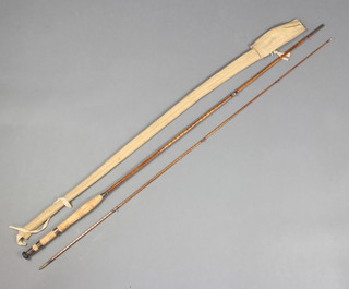 A Milbro 2 piece split cane 8' fly rod together with cloth bag 