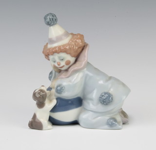 A Lladro figure of a clown with ball and puppy 5278 13cm 