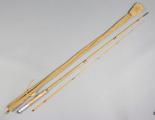 A Marcus Warwick "The Rutlander" 2 piece split cane fly fishing rod contained in a cloth bag 
