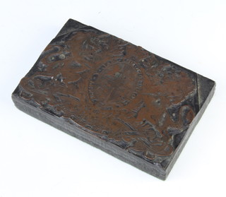 A Victorian printing block decorated the Royal coat of arms 3cm x 15cm x 10cm 