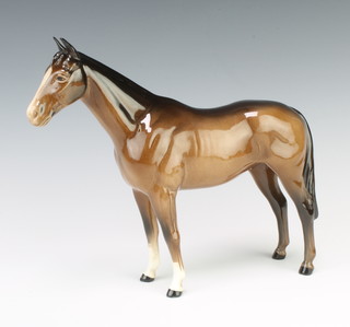 A Beswick brown race horse in a gloss finish 21cm 
