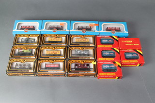 9 Mainline Railways goods vans, 5 Hornby goods vans and 4 Airfix goods vans, all boxed 