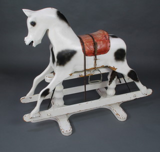 A dappled grey rocking horse 97cm h x 170cm l x 50cm w