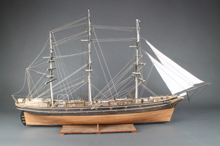 A wooden model of The Cutty Sark 26cm x 120cm x 23cm 