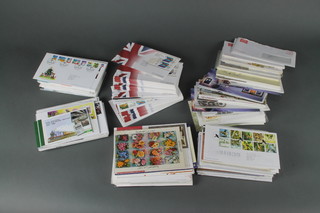 A collection of Elizabeth II GB first day covers, a Philatelia album of world stamps including USSR, Poland, Japan, Hungary, Cuba 
