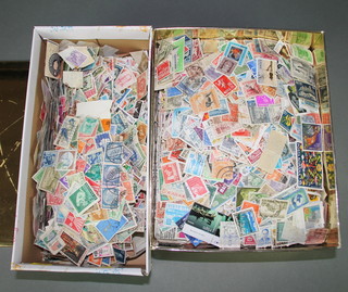 2 boxes of loose world stamps 