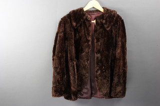 A lady's brown quarter length fur coat 