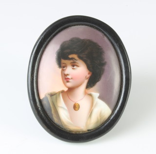A German oval porcelain panel of a young girl 9.5cm x 8cm 