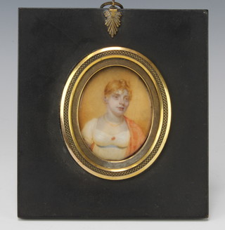 A 19th Century oval watercolour miniature on ivory of a lady with an orange shawl contained in an ebonised frame 6.5cm x 5.5cm 