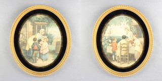 A pair of Bartolozzi prints, study of children with mother, contained in an oval frame with blackened mounts 39cm x 33cm 